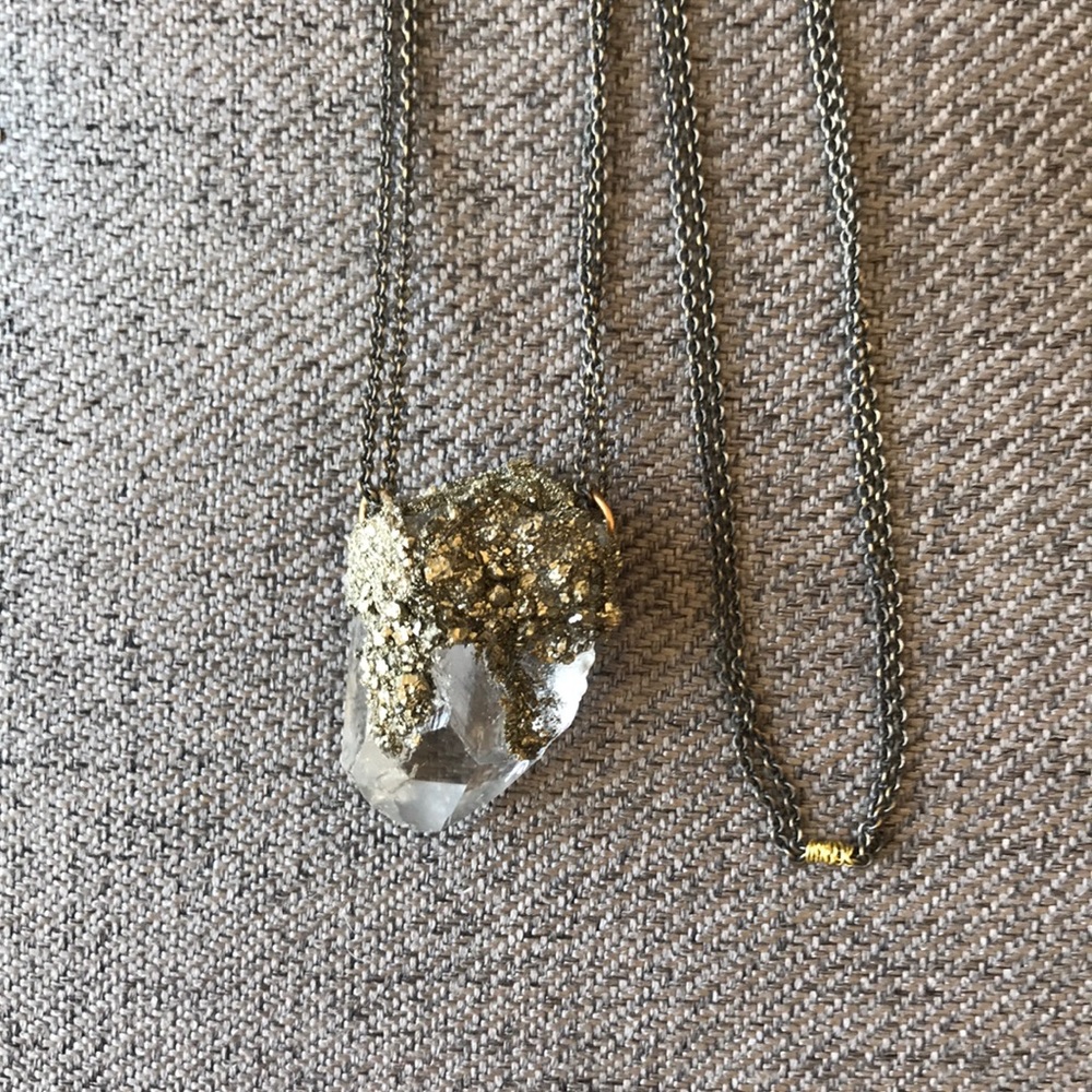 Necklace w/ crystal rock, gold & silver specs